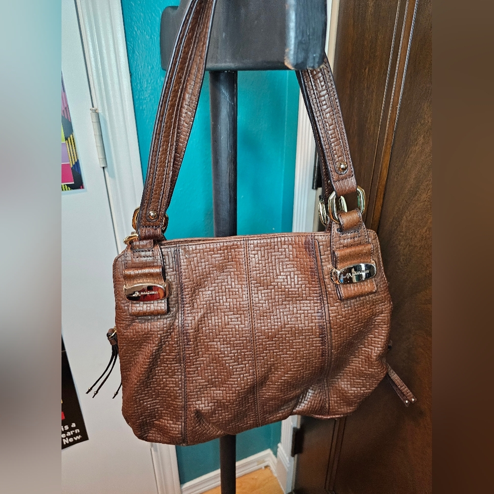 B. Makowsky Brown Leather Bag.